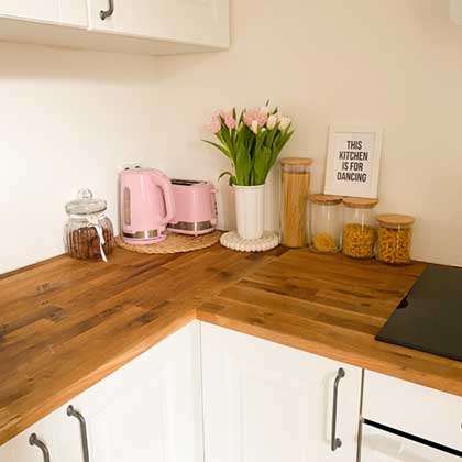 kitchen counter with pink flowers on it