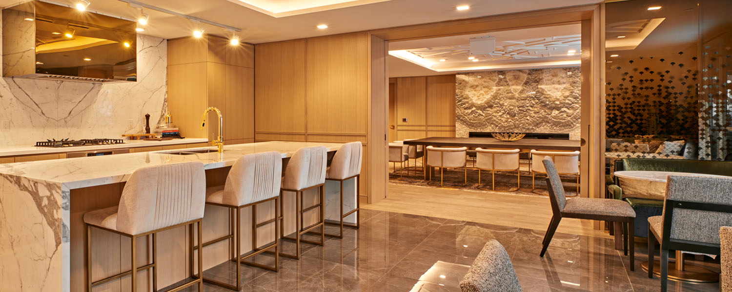 Kitchen and dining area at Minto Yorkville Park. Condos in Yorkville, Toronto.