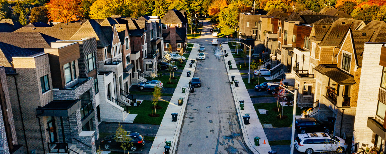 Street-view of single family homes in Etobicoke. Glen Agar by Minto Communities.