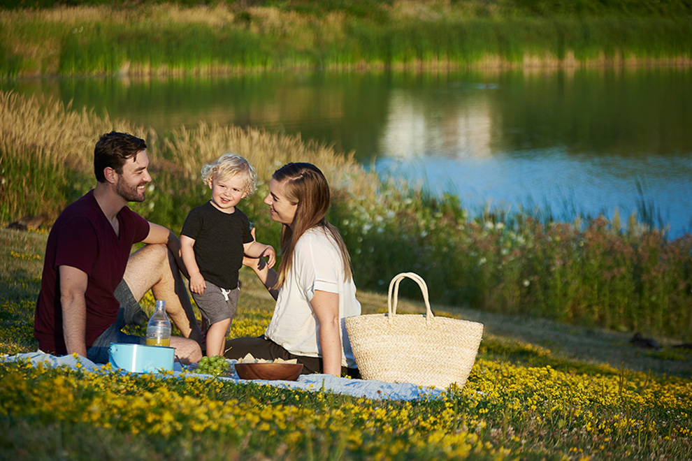 Family having a picnic near Avalon Aquaview Pond
