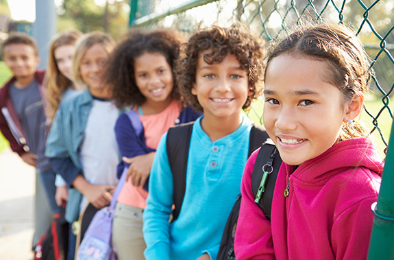 Group of children standing together. Schools in Orléans near Avalon, Minto Communities.