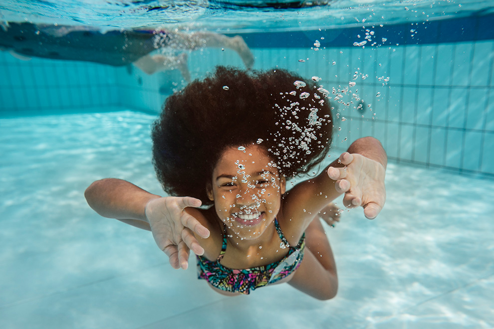 Girl swimming at Minto Recreation Complex in Quinn's Pointe, Barrhaven