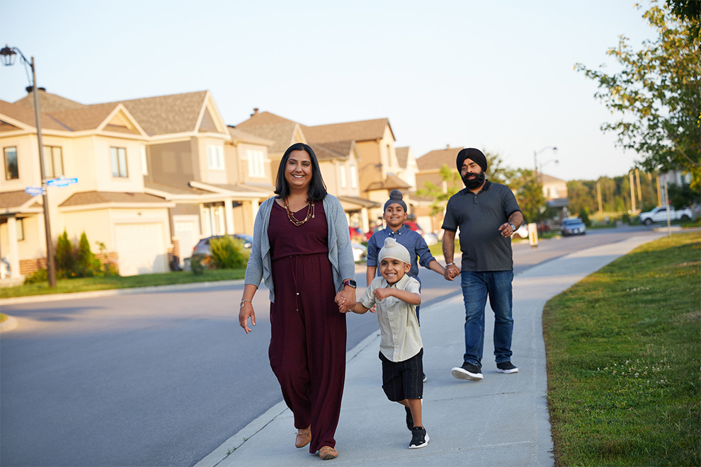 Family walking outside in Quinn's Pointe, Barrhaven