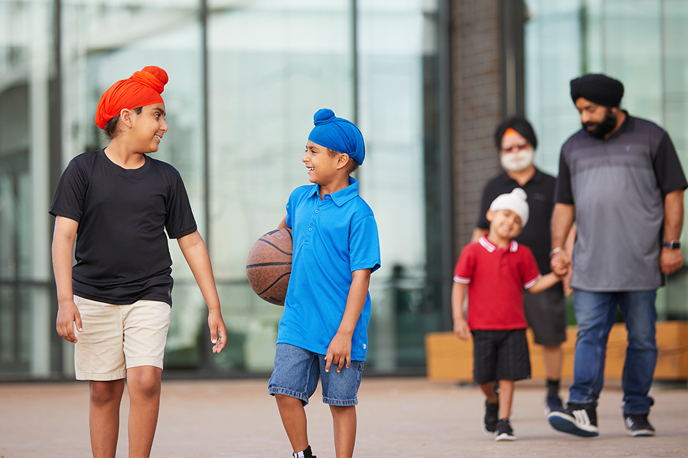 Family playing basketball