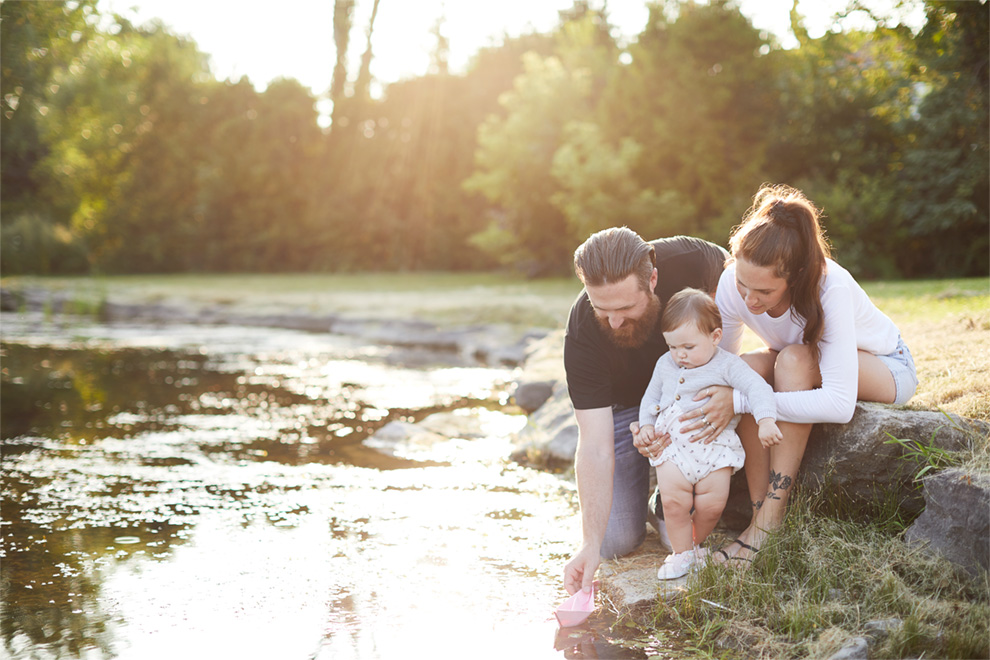 Family playing in Shirley's Brook near Brookline, Kanata