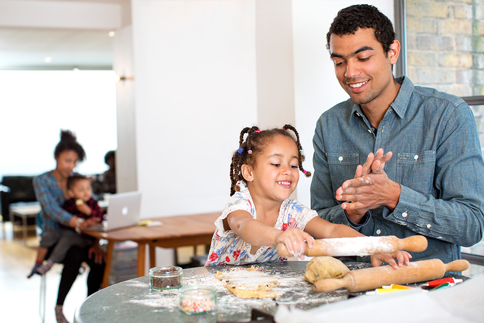 Father and daughter baking