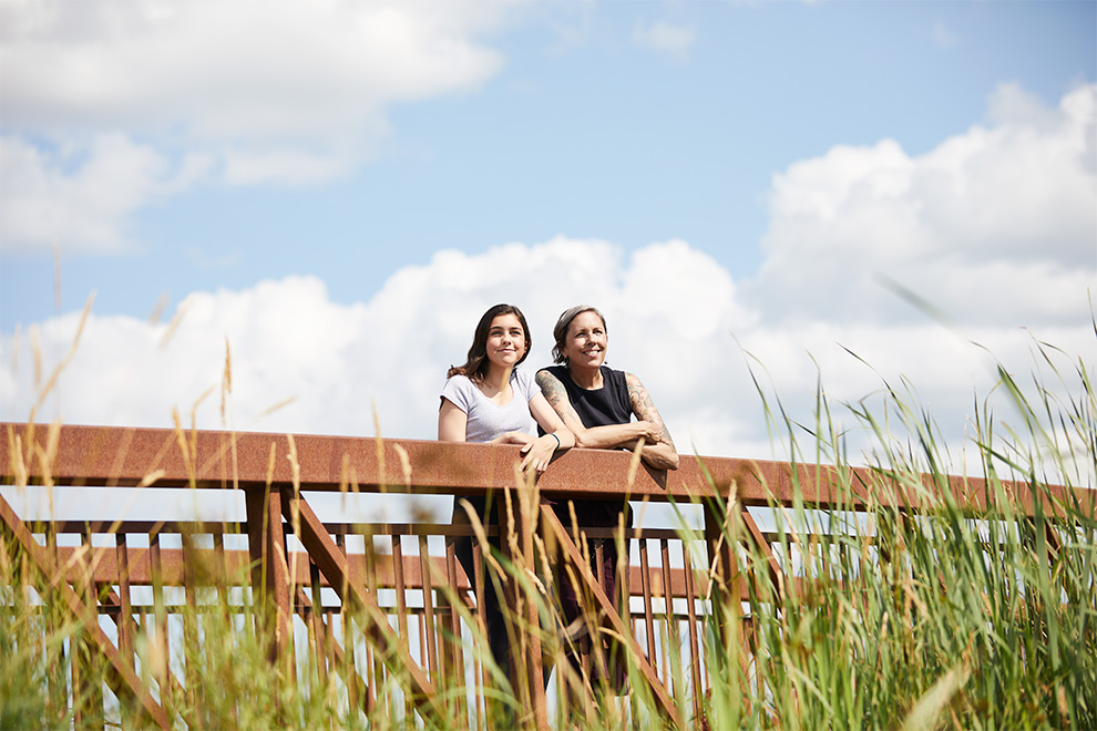 Mother & daughter at Paine Pond in Kanata. New home designs coming to Kanata, winter 2020. Arcadia by Minto Communities