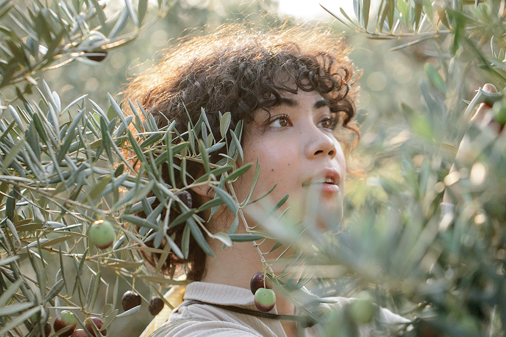 Girl behind a tree