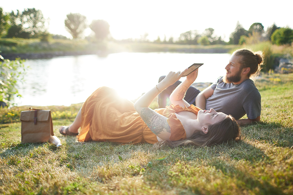 Couple relaxing outside in Kanata