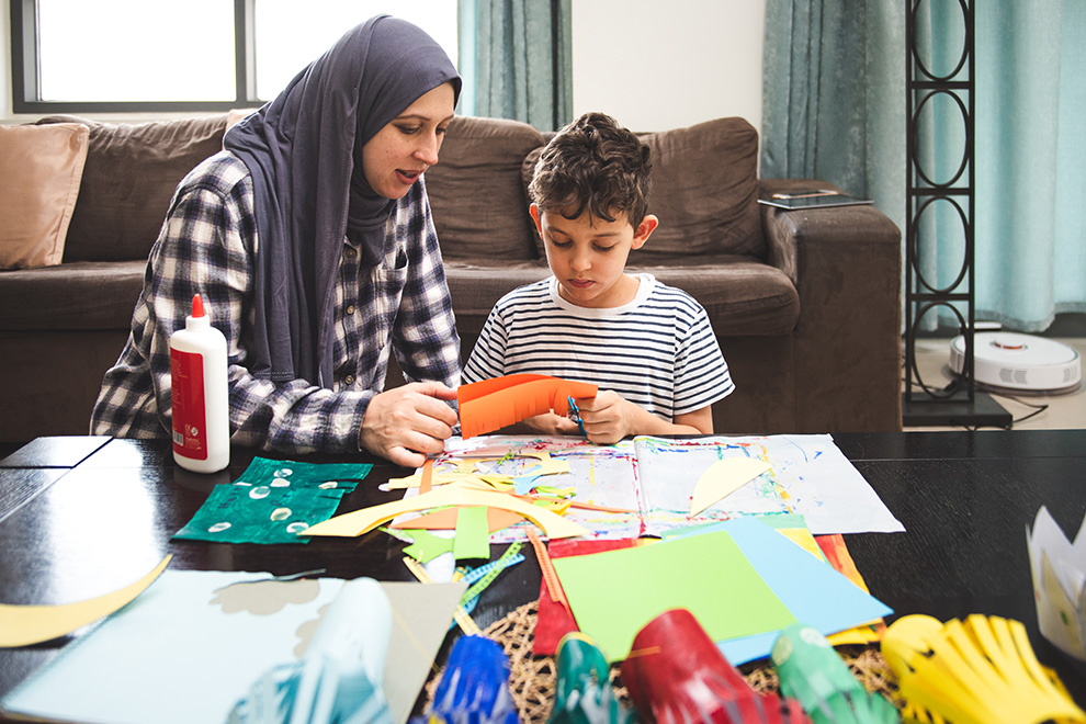 Mother and son making a craft