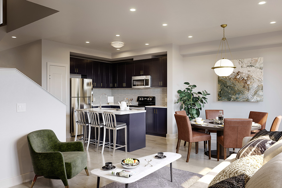 The interior of the Laguna Executive Townhome taken from the sitting room looking out to the kitchen and dining room.