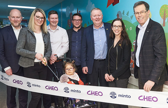 The Ryan family with Minto and CHEO management at the ribbon cutting for the Minto Way hallway dedication