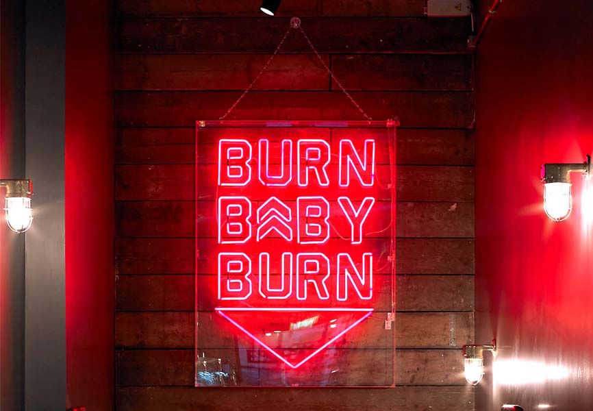 A sign at Barry's Bootcamp saying Burn Baby Burn