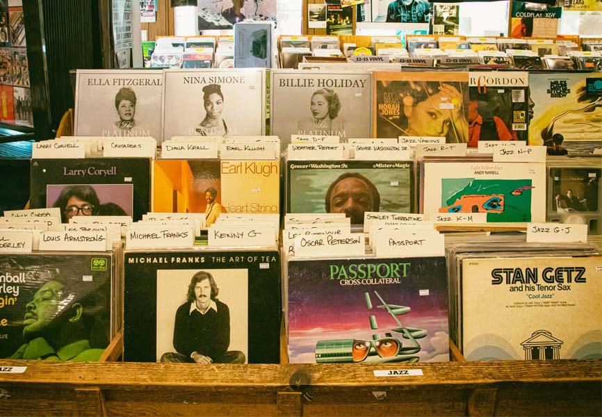 Old record stand outside of a store 