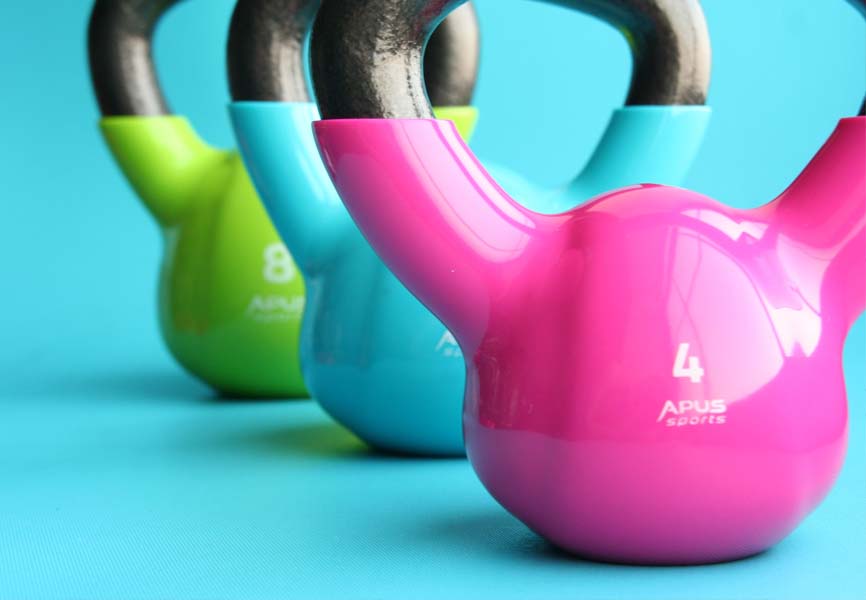 Green, blue, pink kettlebells 