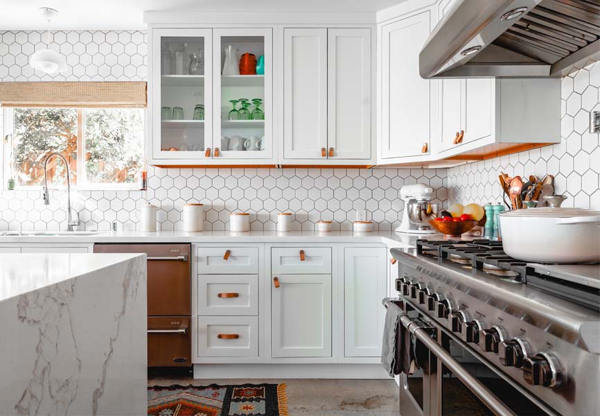 kitchen with high end stove and white shelving