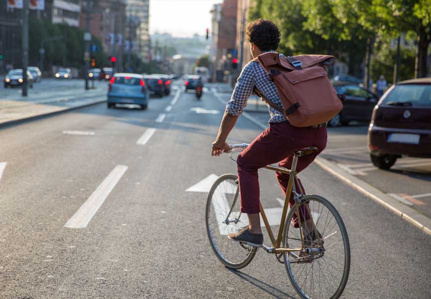 Man riding a bike on the street