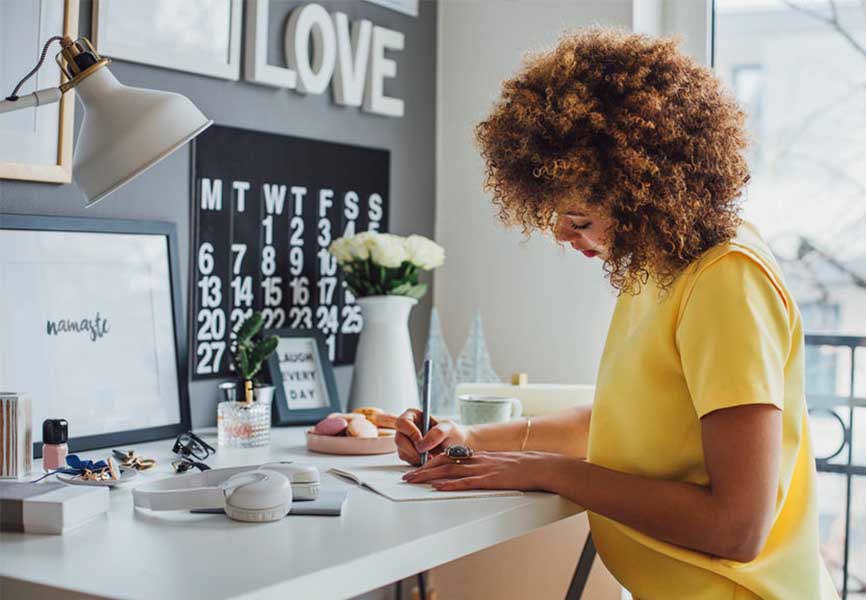 Young woman working at a desk