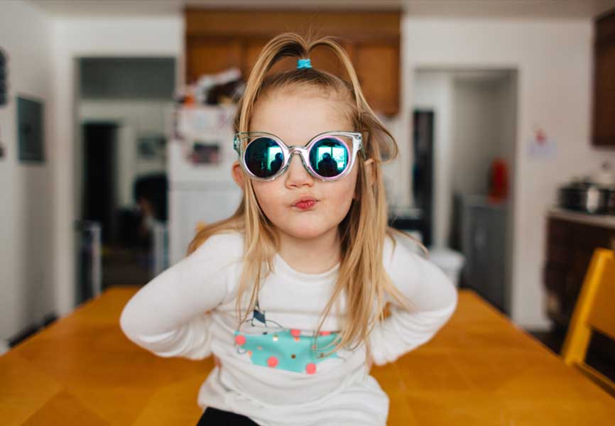 Little girl wearing funky sunglasses