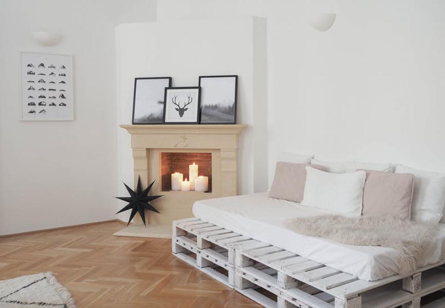 white living room with DIY palette couch in hygge home