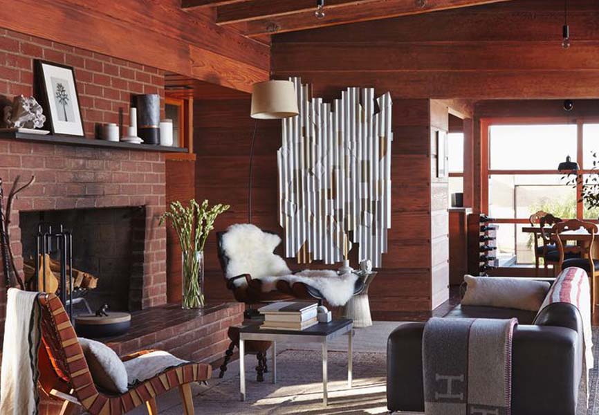 mid century modern living room with brick fireplace