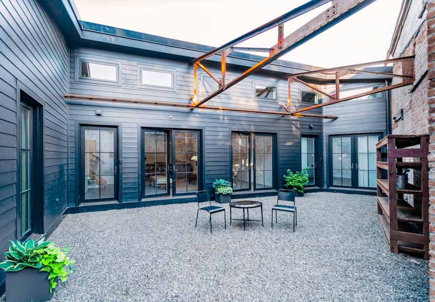 outdoor space at home with plants and pea gravel