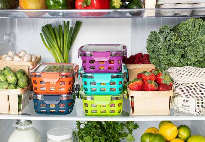 fridge organized with veggies in bins