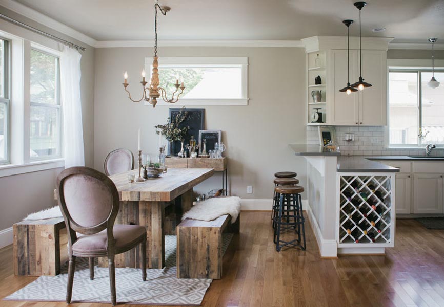 dining room and kitchen with rustic wood table and bench seats
