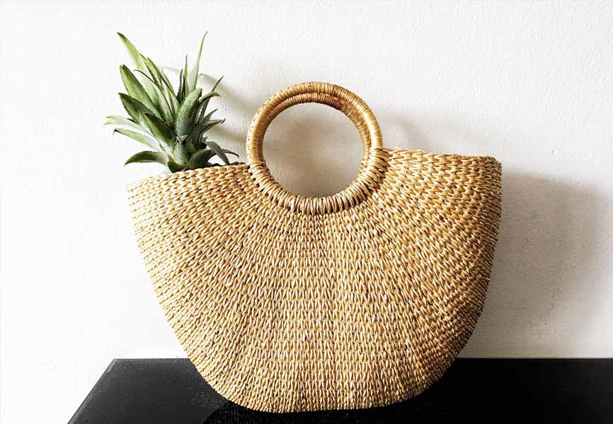 wicker basket with pineapple inside