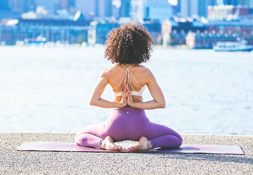 Girl doing yoga outside
