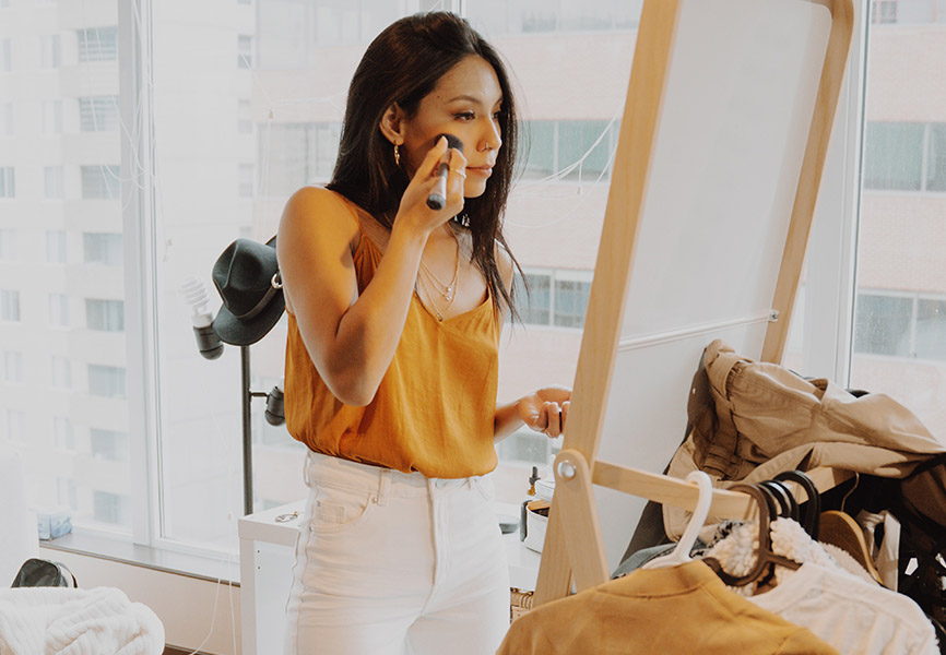 Girl getting ready in apartment