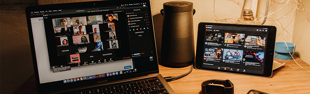 Desk with laptop on a zoom call