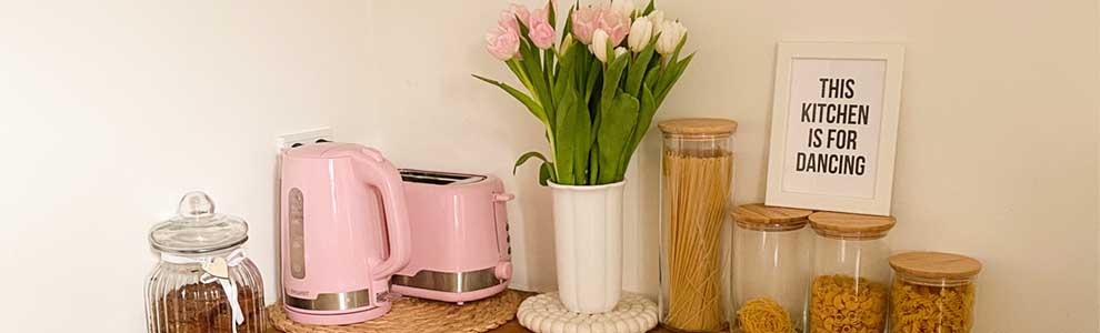 kitchen counter with pink flowers on it