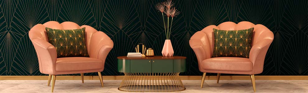Two pink channel tufting chairs against a dark wall backdrop