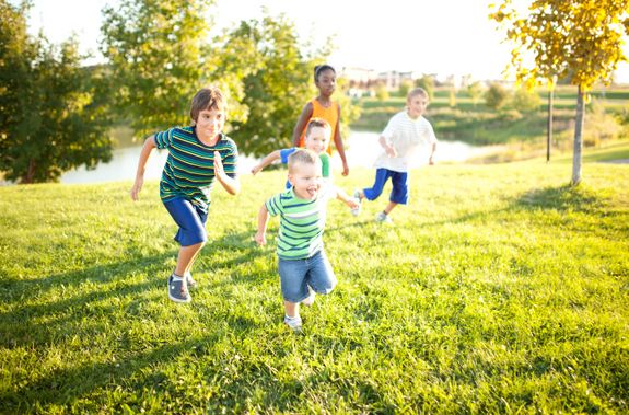 Kids playing in the park. Avalon: a community for all life stages.