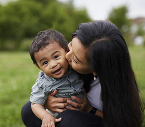 Mother and son playing outside