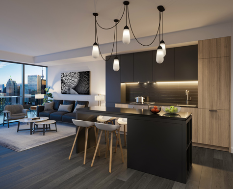 Kitchen and living area of a suite at The Saint. New condos for sale at Church & Adelaide, Toronto. Minto Communities.