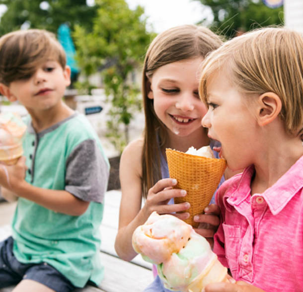 Children eating ice cream outdoors. The Heights of Harmony in Oshawa.