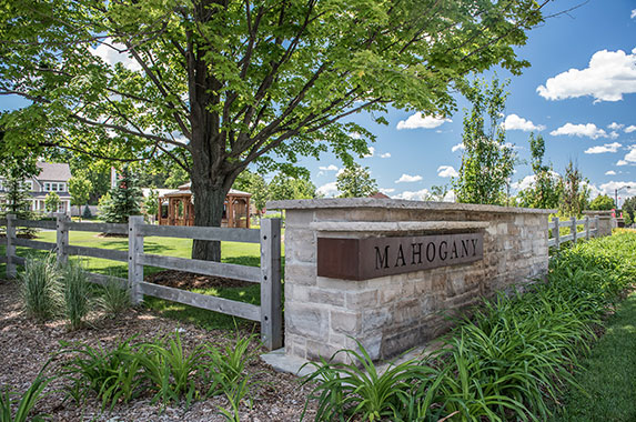 Sign for Mahogany homes in Manotick. Why Mahogany homes by Minto Communities gives you more.