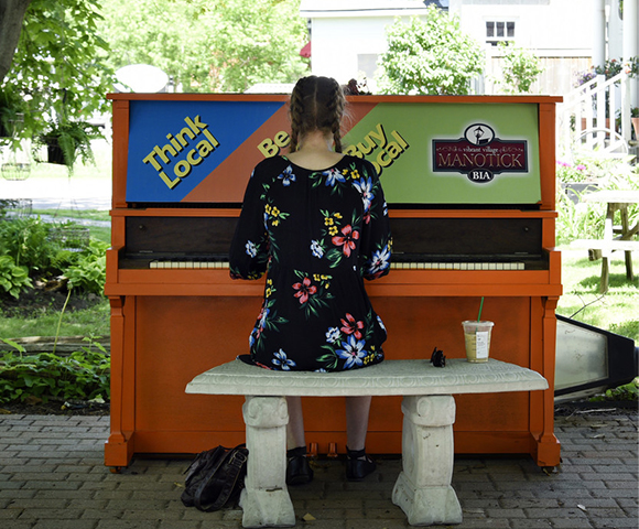 Woman playing piano in Manotick