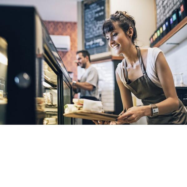 Woman Working at Cafe