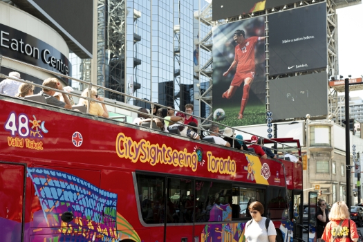 Toronto City sightseeing bus. New condos for sale at Church & Adelaide. The Saint by Minto Communities